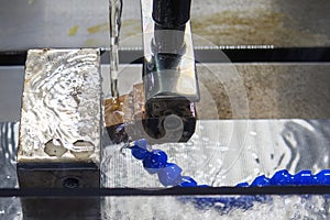 The operation of side spark EDM machine with copper electrode