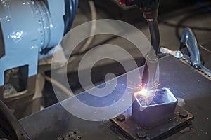 The operation of welding robot machine making part .