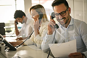 .Operations center talking on Landline phone. Operator