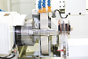 Operator grinding mold and die part