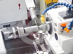 Operator grinding mold and die part