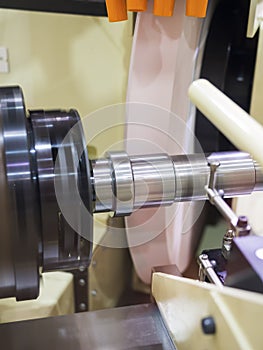 Operator grinding mold and die part