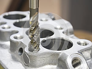 Operator machining automotive parts