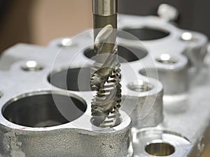Operator machining automotive parts