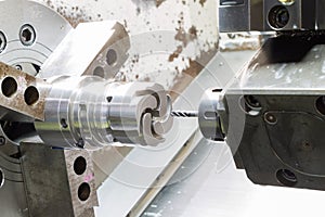 Operator machining die casting machine parts