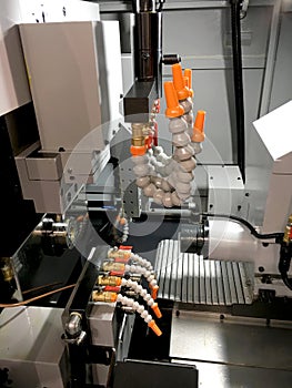 Operator make automotive parts by cnc lathe.