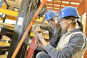 Operator and overseer working