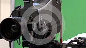 Operator with a professional video camera in a television Studio.