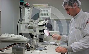 The operator with the silicon wafer