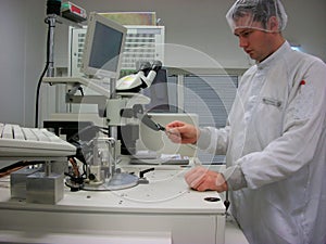 The operator with the silicon wafer