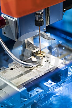 Operator use EDM electrod to make precision mold and die