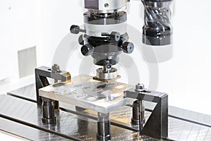 Operator use EDM electrod to make precision mold and die photo