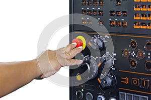 Operator use finger press emergency stop of control panel cnc lathe machine or machining center isolated on white background with