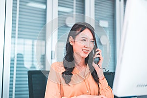 Operator women working with phone at office,Smiling call center women