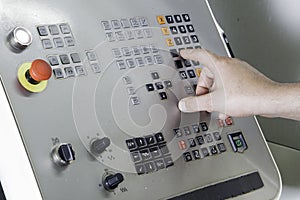 Operator working CNC machine