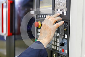 Operator working with CNC machining center