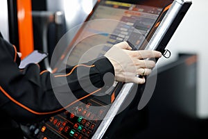 Operator working with touch screen control panel