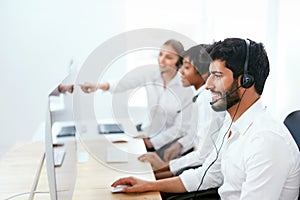 Operators Working On Hotline In Call-Center