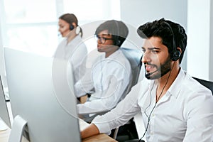Operators Working On Hotline In Call-Center photo
