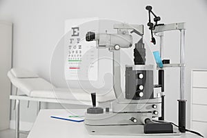 Ophthalmic slit lamp at doctor office photo