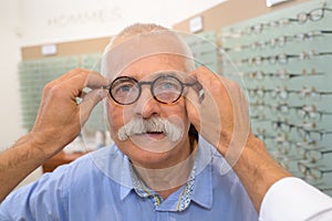 Ophthalmologist checking glasses eyes