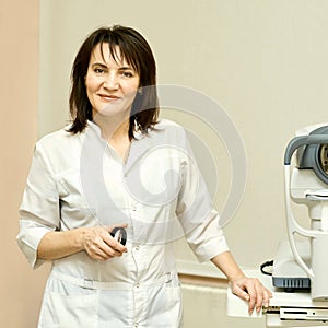 Ophthalmologist doctor in exam optician laboratory with female patient. Eye care