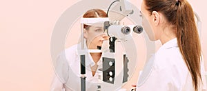 Ophthalmologist doctor in exam optician laboratory with female patient. Eye care medical diagnostic. Eyelid treatment