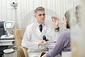 Ophthalmologist Examining Patient