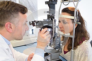 Ophthalmologist examining patient`s eyes