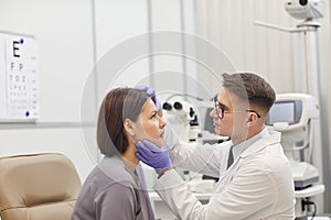 Ophthalmologist Examining Woman