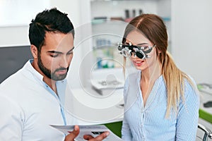 Ophthalmology Clinic. Eye Doctor Testing Woman Eyesight