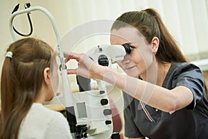 ophthalmology. female doctor checks eyesight of child. BeH3althy