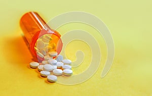 Opioid Crisis - Open Bottle of Prescription Painkillers photo