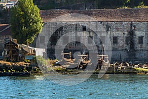 Oporto, Portugal - july 2016: Wooden Slipway and Rabelo Boats on the Bank of the River Douro - Porto, Portugal
