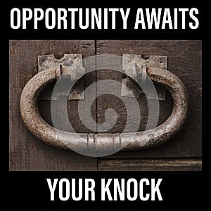 Opportunity awaits your knock sign. Large rustic door knocker, vintage metal on an old wooden door.