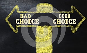 Opposite Arrows With Bad Choice Versus Good Choice formed with wooden letters