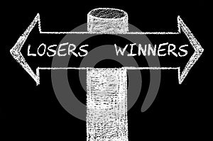 Opposite arrows with Losers versus Winners photo