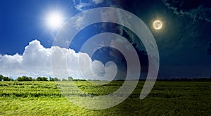 Opposites in nature: day and night, light and darkness, sun and moon above green field. Passing of time and changes concept image