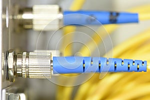 Optic fiber cables on distribution panel