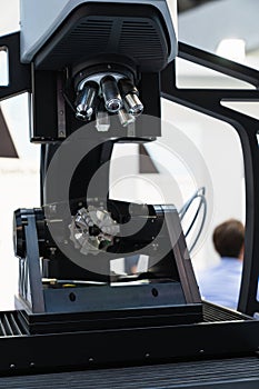 Optic machine for precise measurement of part size and quality evaluation. Smart factory photo
