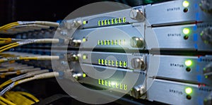 Optical Cables close up. Datacenter rack. Technology concept.