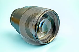 Optical digital camera lens isolated on blue background