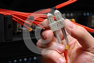 Optical fiber high speed data cable held in hand