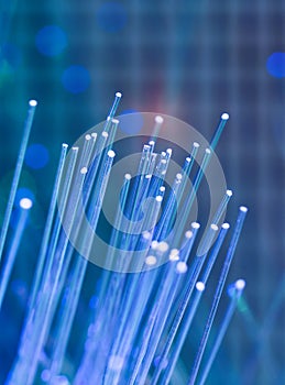 Optical fibres dinamic flying from deep on technology background