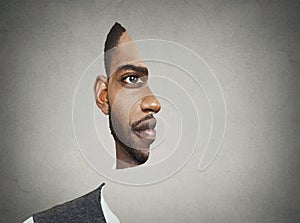 Optical illusion portrait front with cut out profile of a man