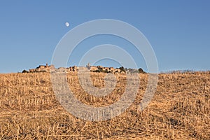 Optical illusion of a village behind the hill