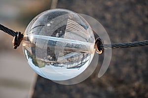 Optical illusions in a crystal sphere