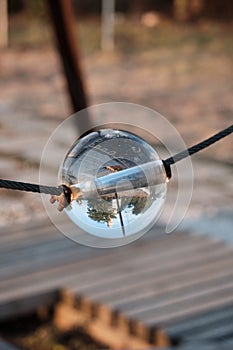 Optical illusions in a crystal sphere