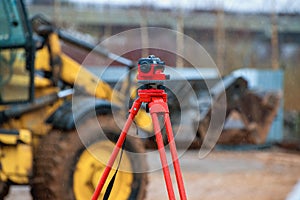 optical level on a rainy day with shallow depth of field