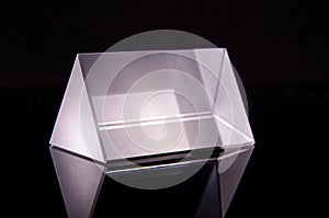 Optical prism for experiments isolated on the black background